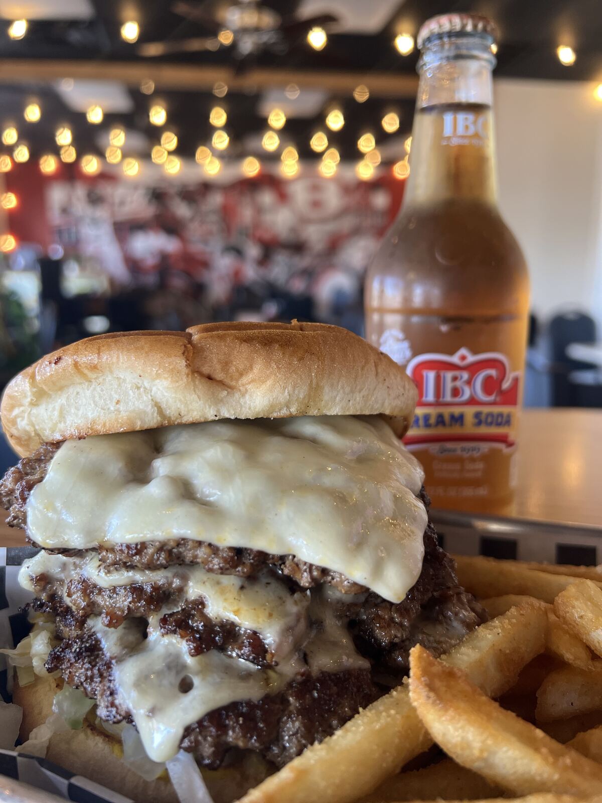 B Town double cheeseburger with bacon and fries